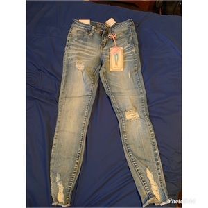 Light Wash Distressed Skinny Jeans